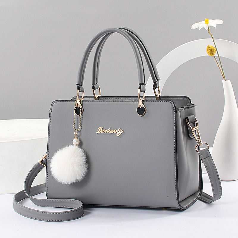 Elegant Lightweight Faux Leather Handbag - Women's Solid Color Shoulder Bag with Tassel Embellishment, Adjustable Strap, Zipper Closure, Polyester Lined, Edge Paint Detail - Available in Multiple Colors